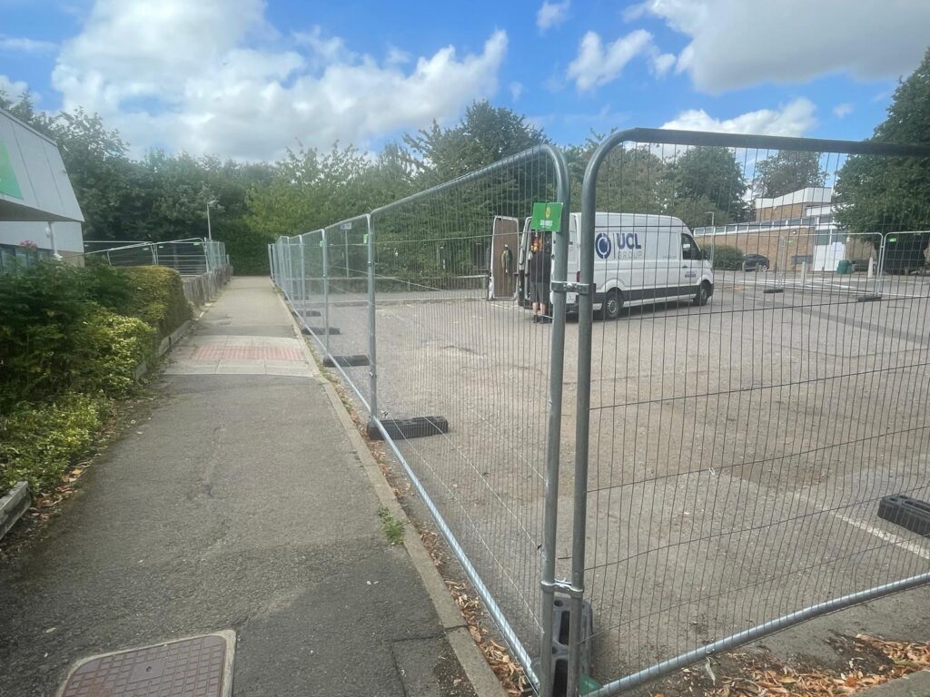 Area in car park for construction work fenced off