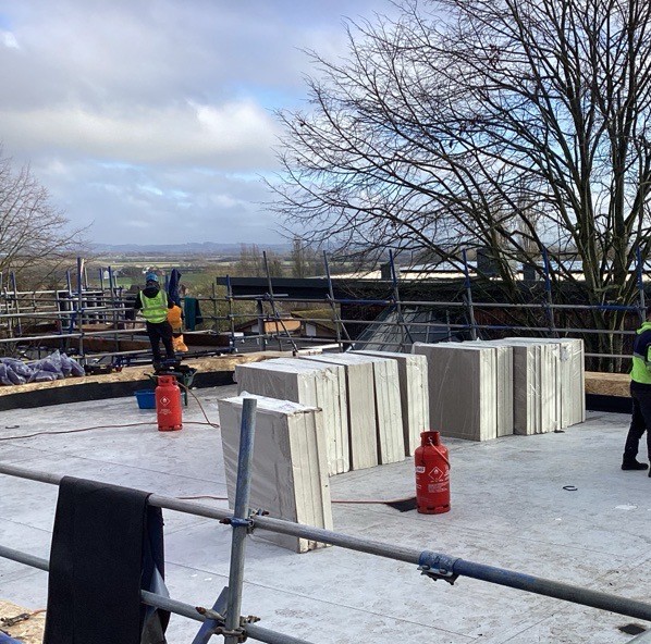 Workers on the roof at Park Sports Centre